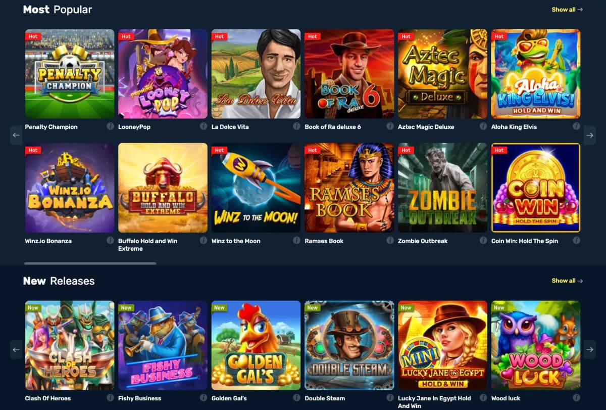 En spilloversikt fra Winz.io som viser populære og nye spilleautomater som "Penalty Champion", "Winz.io Bonanza", og "Lucky Jane in Egypt Hold And Win".